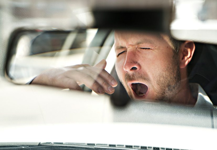 Man-yawning-with-driver-fatigue