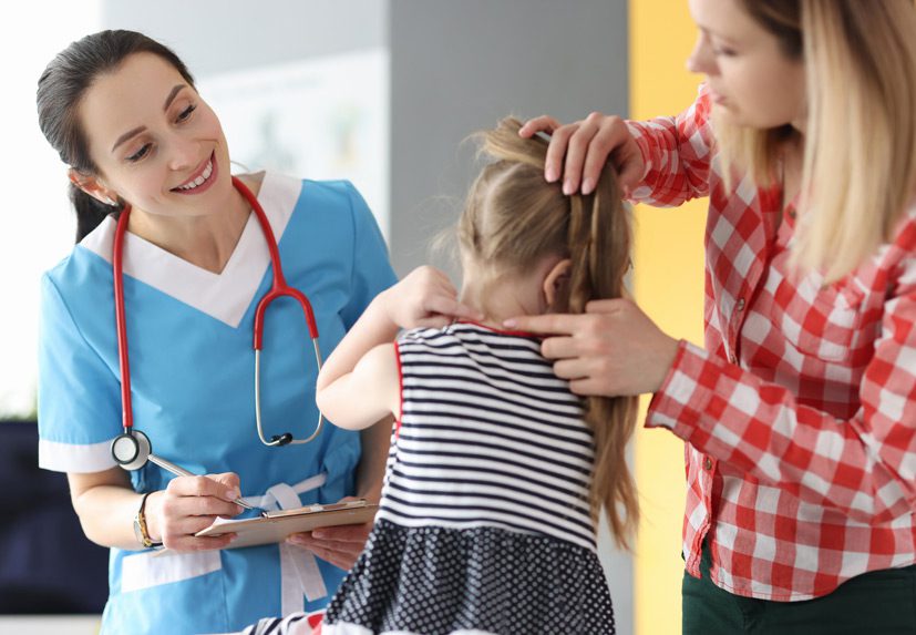 Nurse-evaluating-child’s-daycare-injury