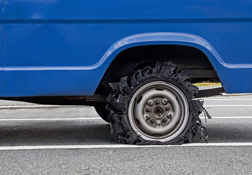Vehicle-with-tire-blowout