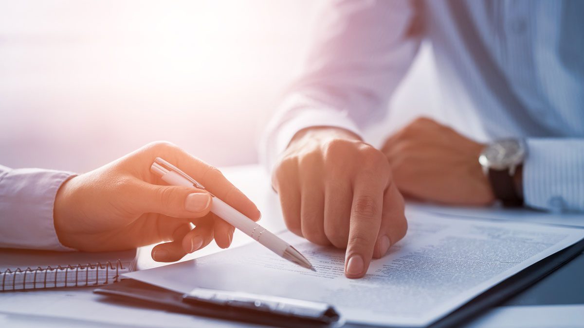 People negotiating on a insurance contract