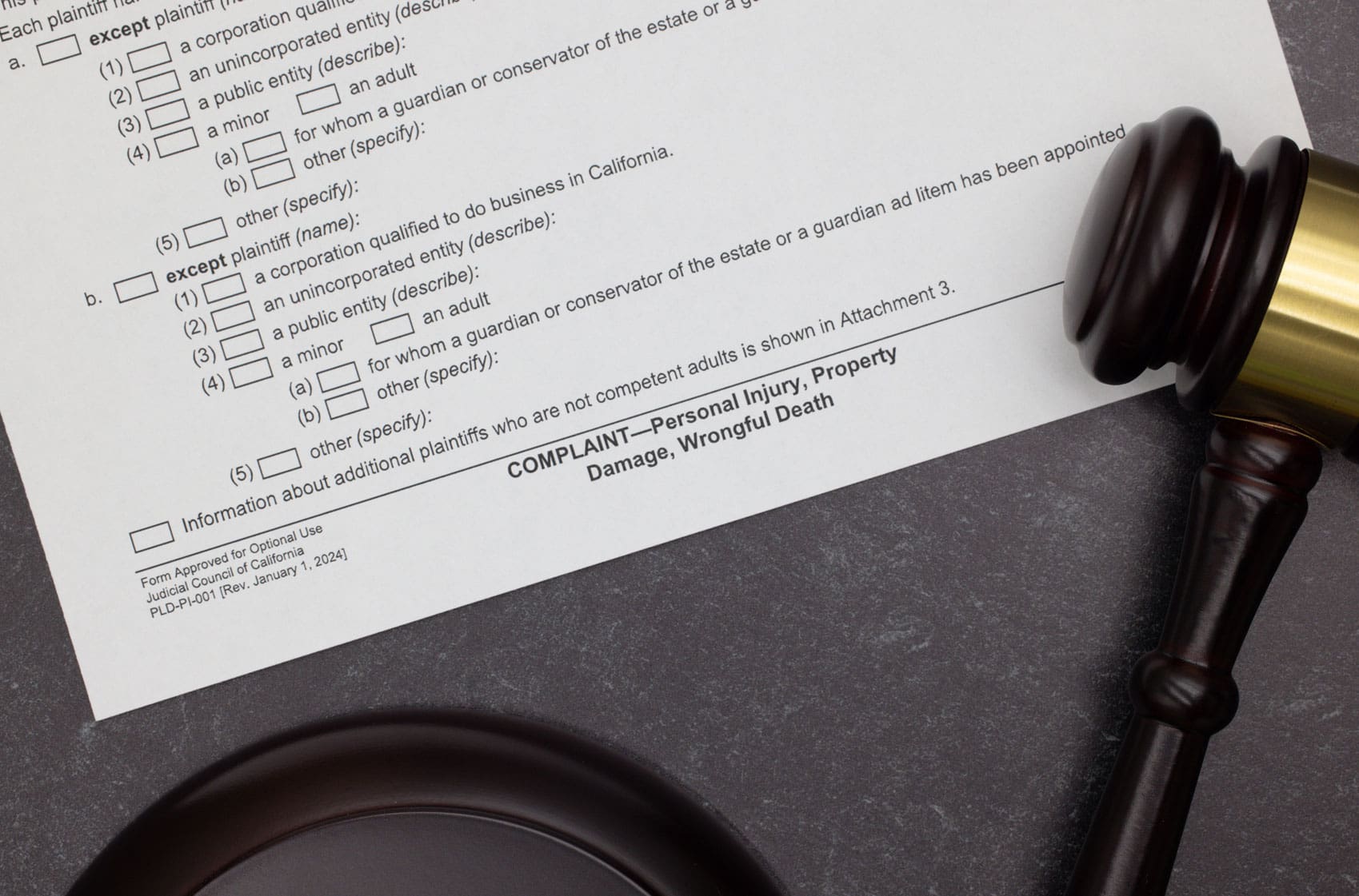 legal-document-on-a-desk-next-to-a-gavel